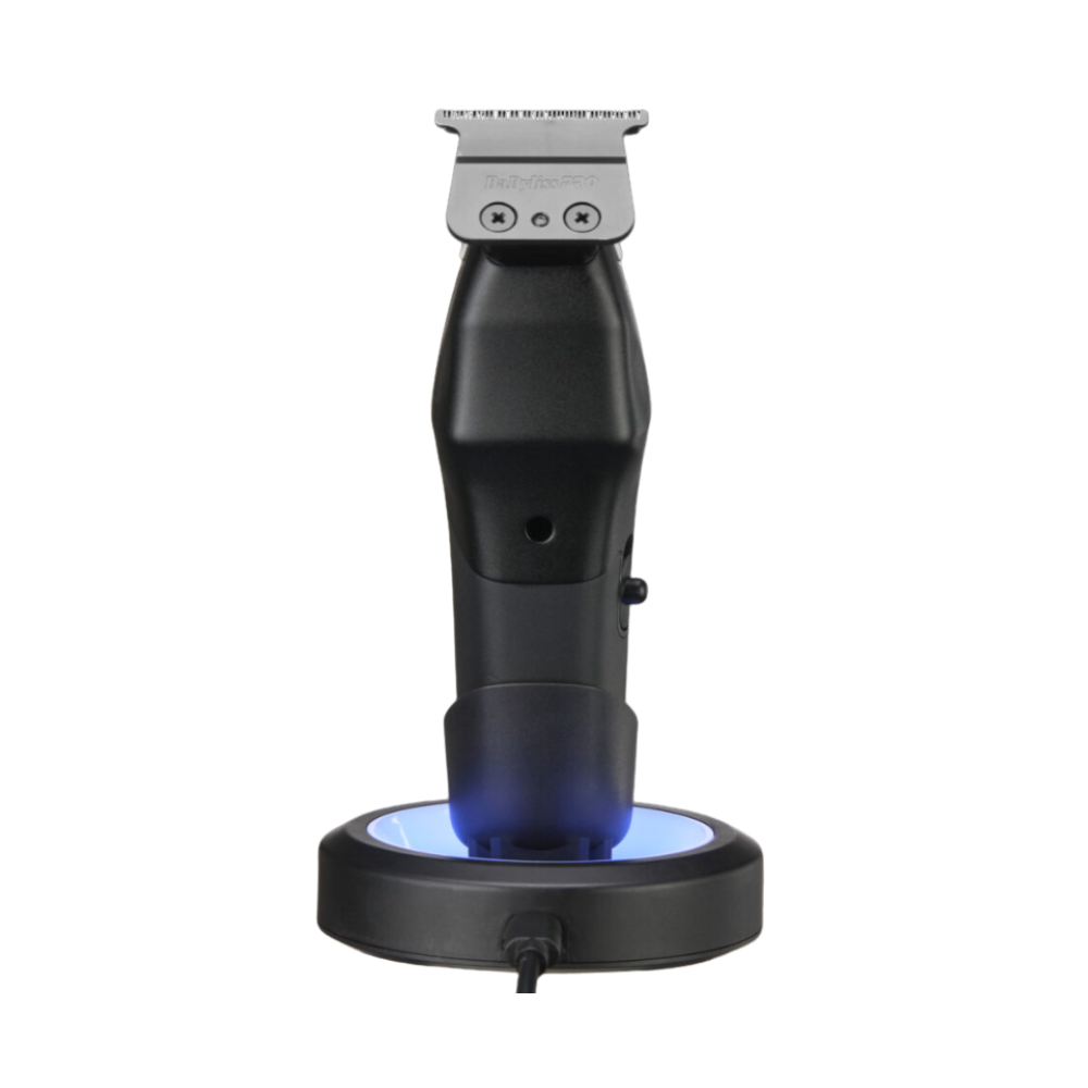 Black grooming tool with blue light on a white background