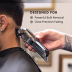 Person using a hair trimmer with text highlighting features on a blurred background