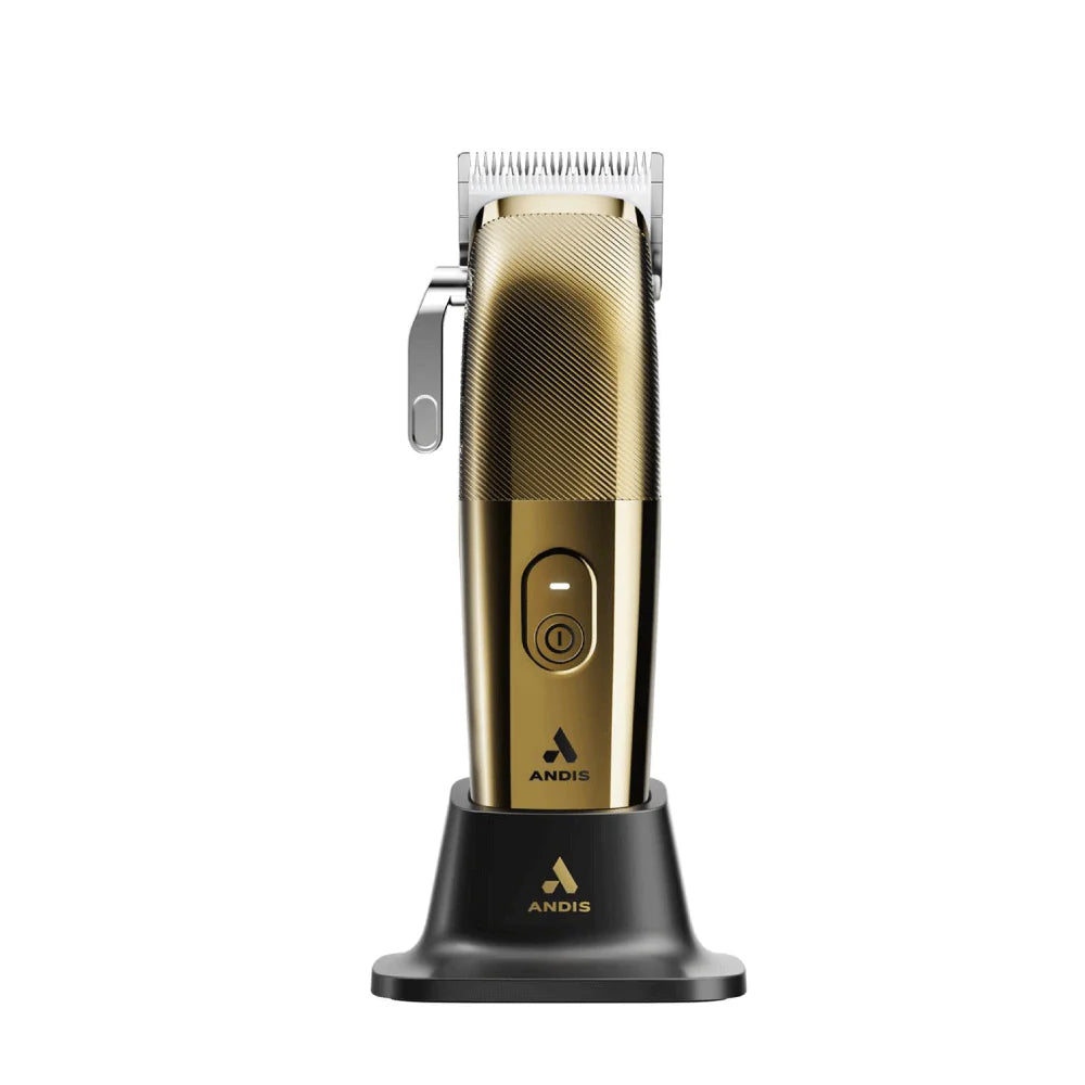 Gold and black Andis hair clipper on a white background